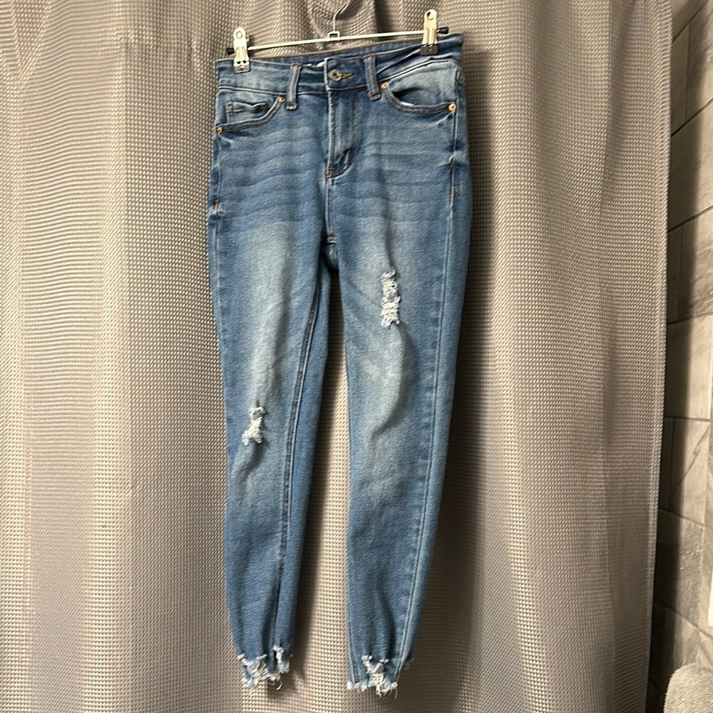 Distressed Blue Denim Jeans